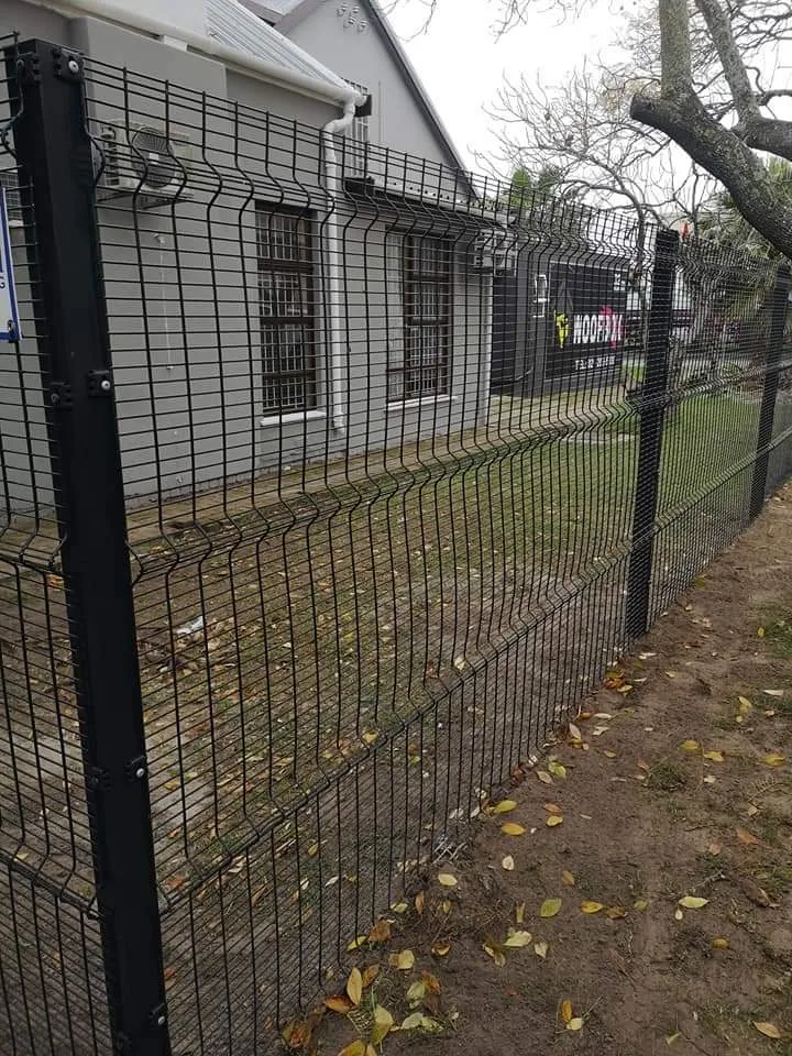Long run of black Clearview mesh fencing protecting a commercial property in Cape Town, Western Cape