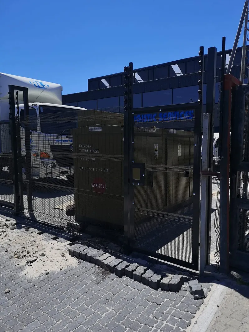 Completed black Clearview mesh double gate securing commercial logistics depot in Cape Town, Western Cape