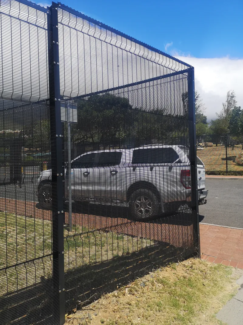 Black clearview anti-climb fence securing commercial parking area in Cape Town