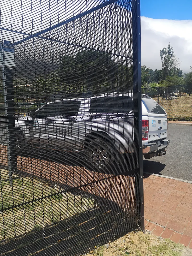 Clearview mesh boundary fence at commercial parking lot in Cape Town