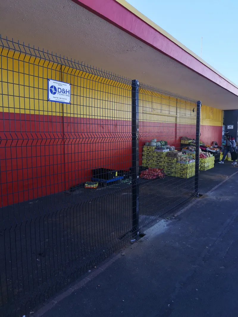 D&H Fencing branded Clearview mesh securing produce shop frontage in Cape Town