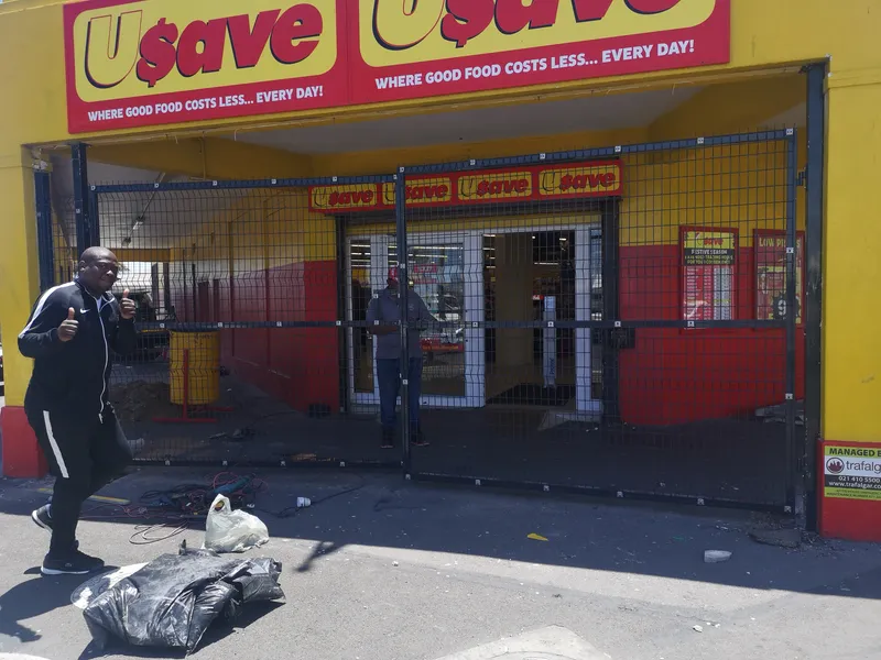 Completed Clearview mesh fence and gate securing Usave supermarket entrance in Cape Town