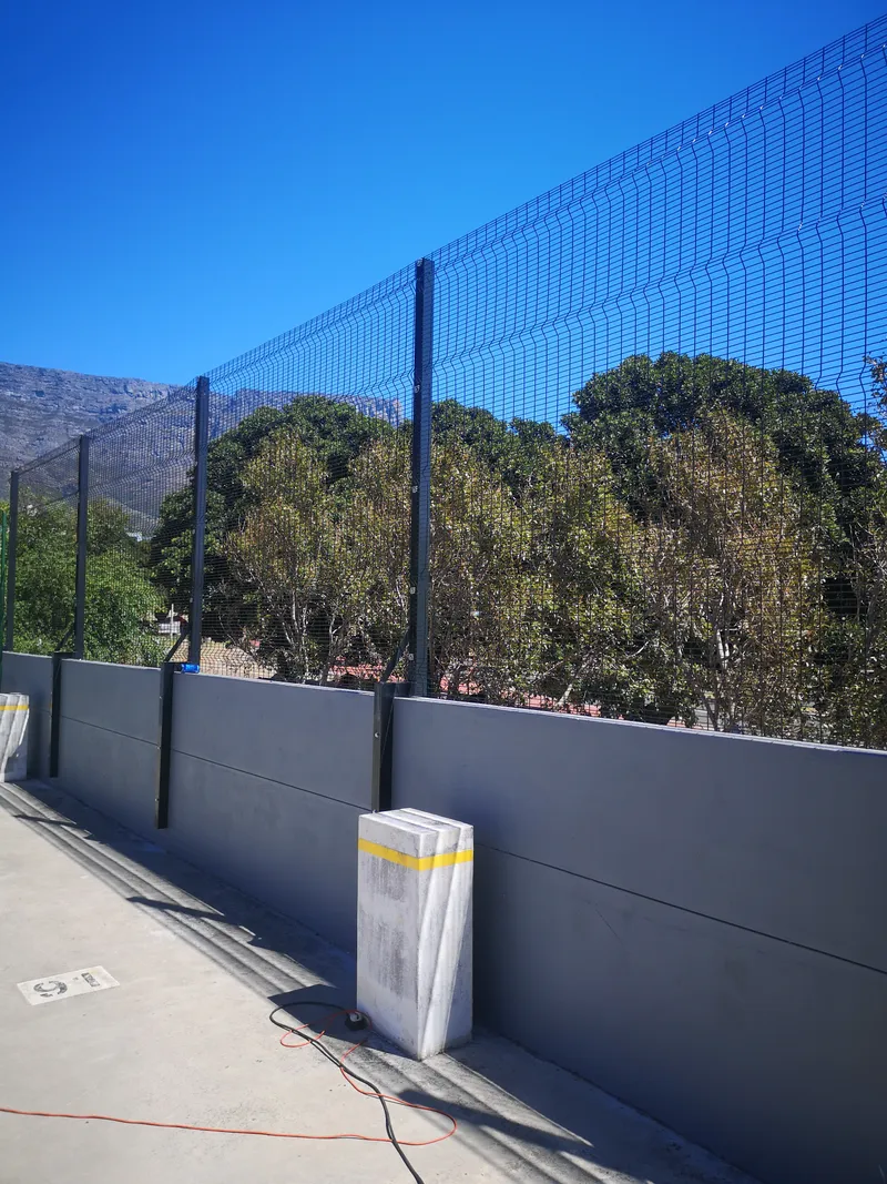 Clearview anti-climb fence panels mounted above precast concrete wall in Cape Town
