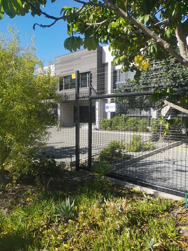 Clearview mesh perimeter fence outside modern commercial building in Cape Town