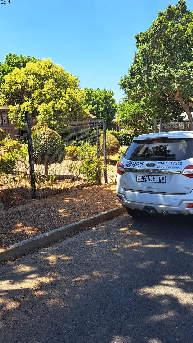 Clearview mesh boundary fence with sliding gate at a residential property in Cape Town, Western Cape