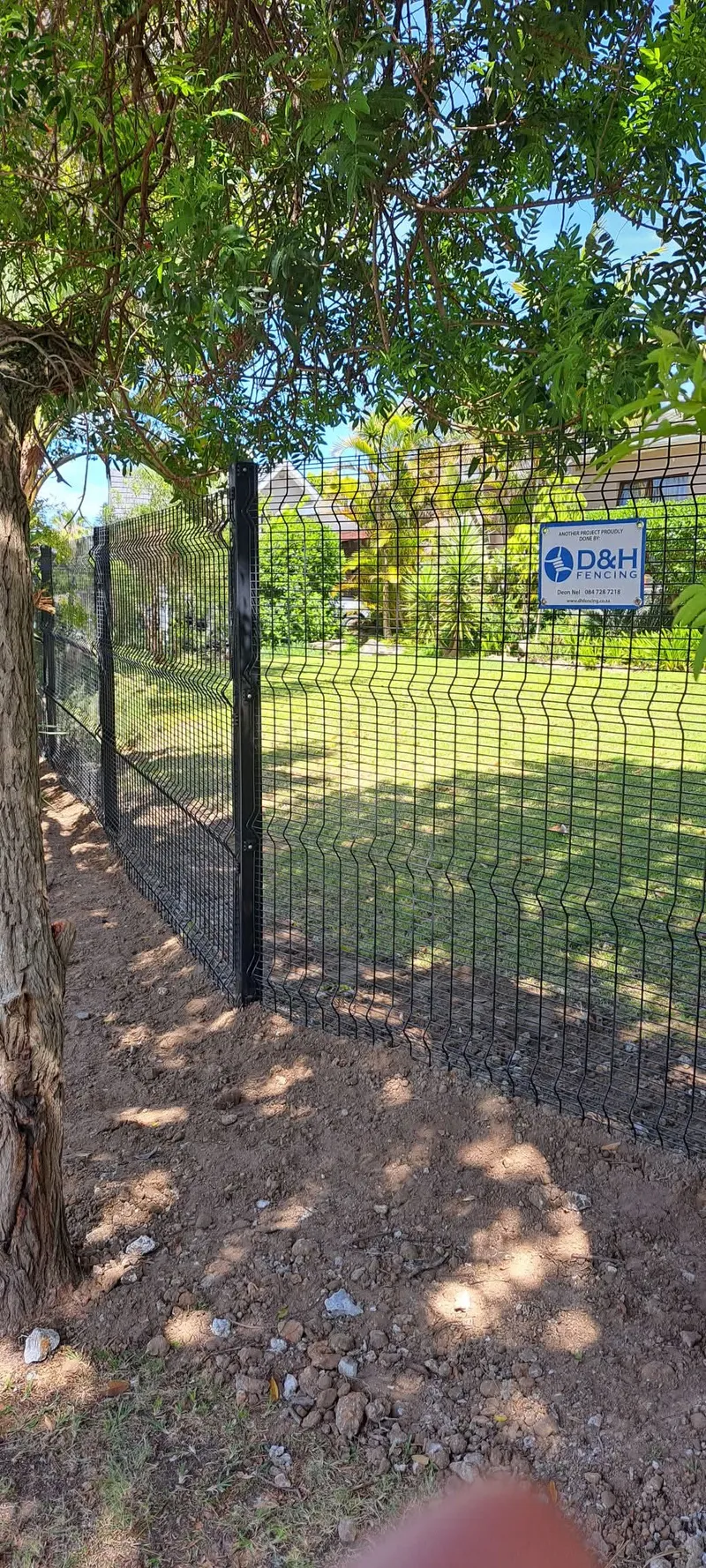 Black Clearview mesh anti-climb fence with pedestrian gate at residential property in Cape Town, Western Cape