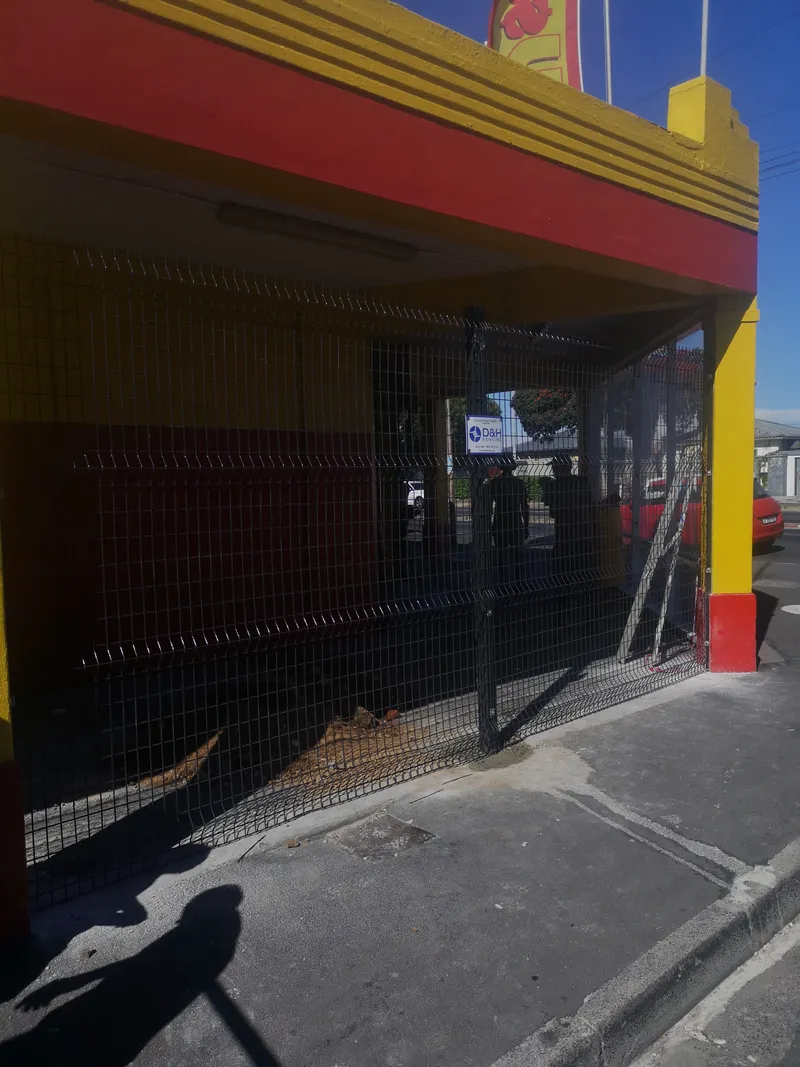 Black Clearview fence panels securing commercial storefront perimeter in Cape Town