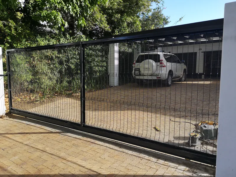 Clearview mesh driveway sliding gate installed at Cape Town residential property