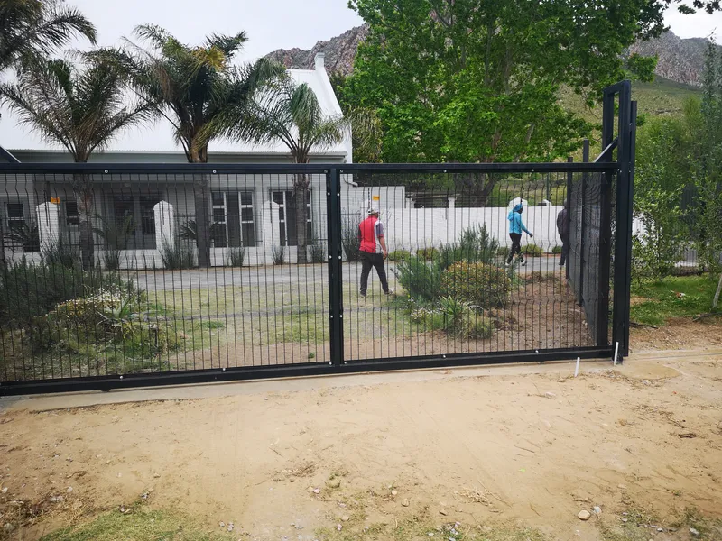 Clearview mesh sliding driveway gate installed at residential home in Western Cape
