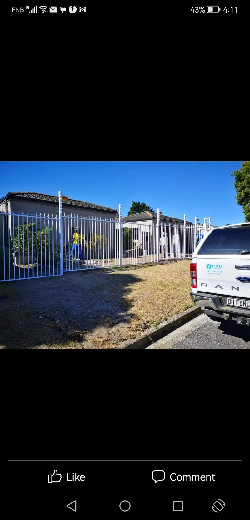 White steel tubular bar fence with sliding gate at Cape Town residential home, installed by D&H Fencing
