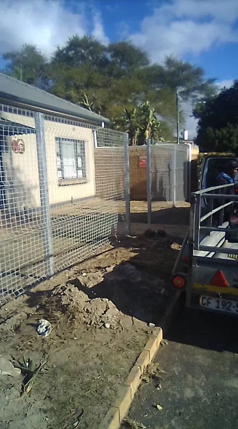 D and H Fencing van and galvanised welded mesh fence at Cape Town home install